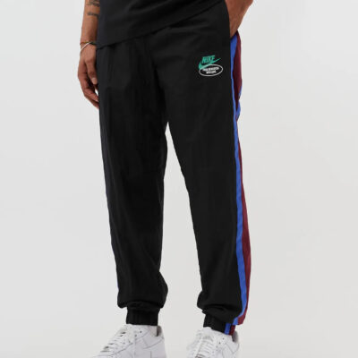 NIKE WOVEN UNLINED TRACK PANTS